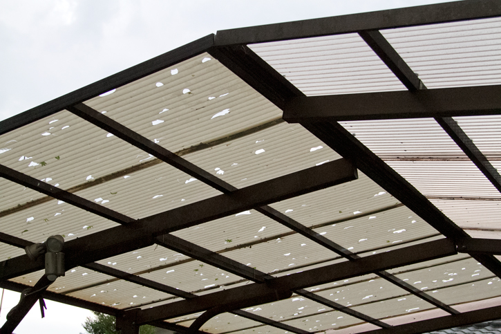 hail damage on car port